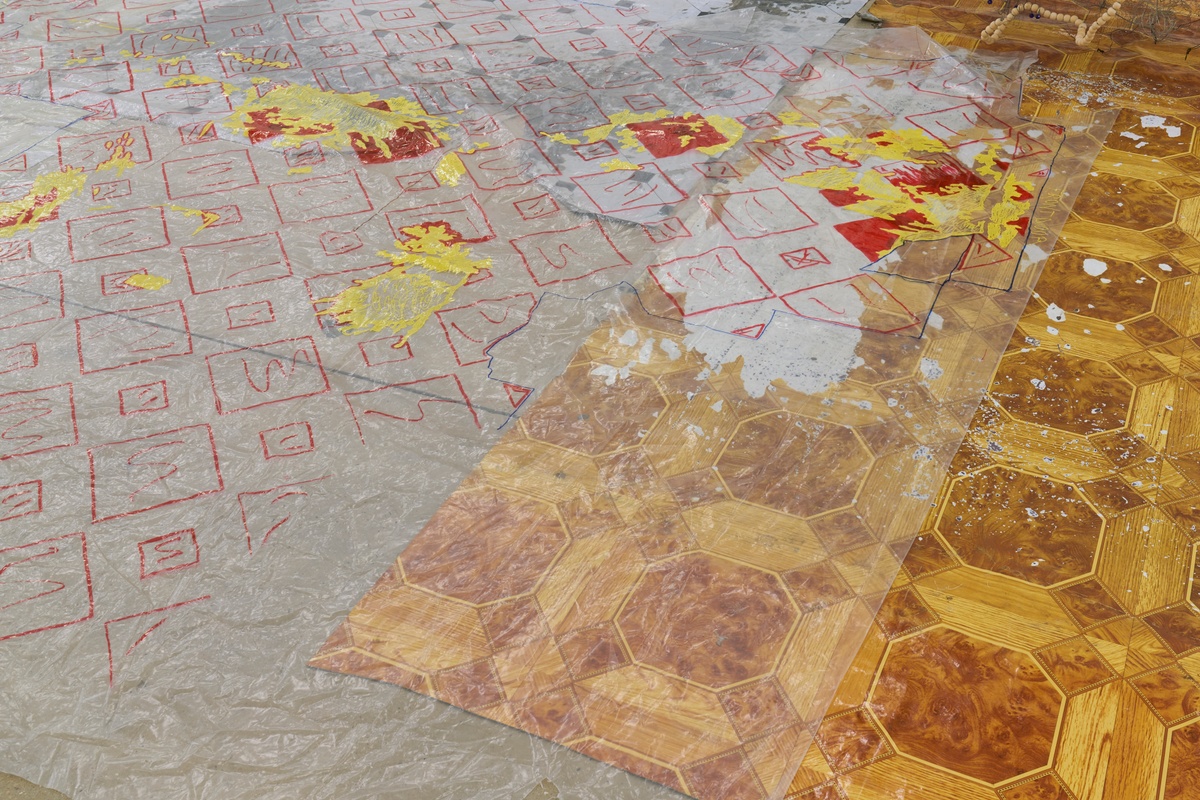 Process photograph from ‘Open Production’, Igshaan Adams’ hybrid studio/exhibition in A4’s Gallery. Nylon flooring and a tracing in preparation for ‘Rentmeesterin’ lie on the gallery floor.
