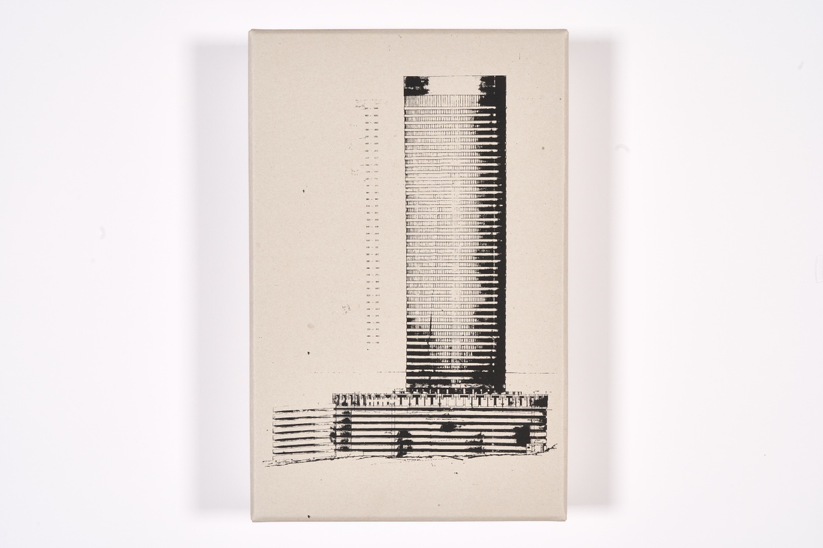 A topdown photograph of the packaging for Mikhael Subotzky and Patrick Waterhouse's photo-book 'Ponte City' on a white background.
