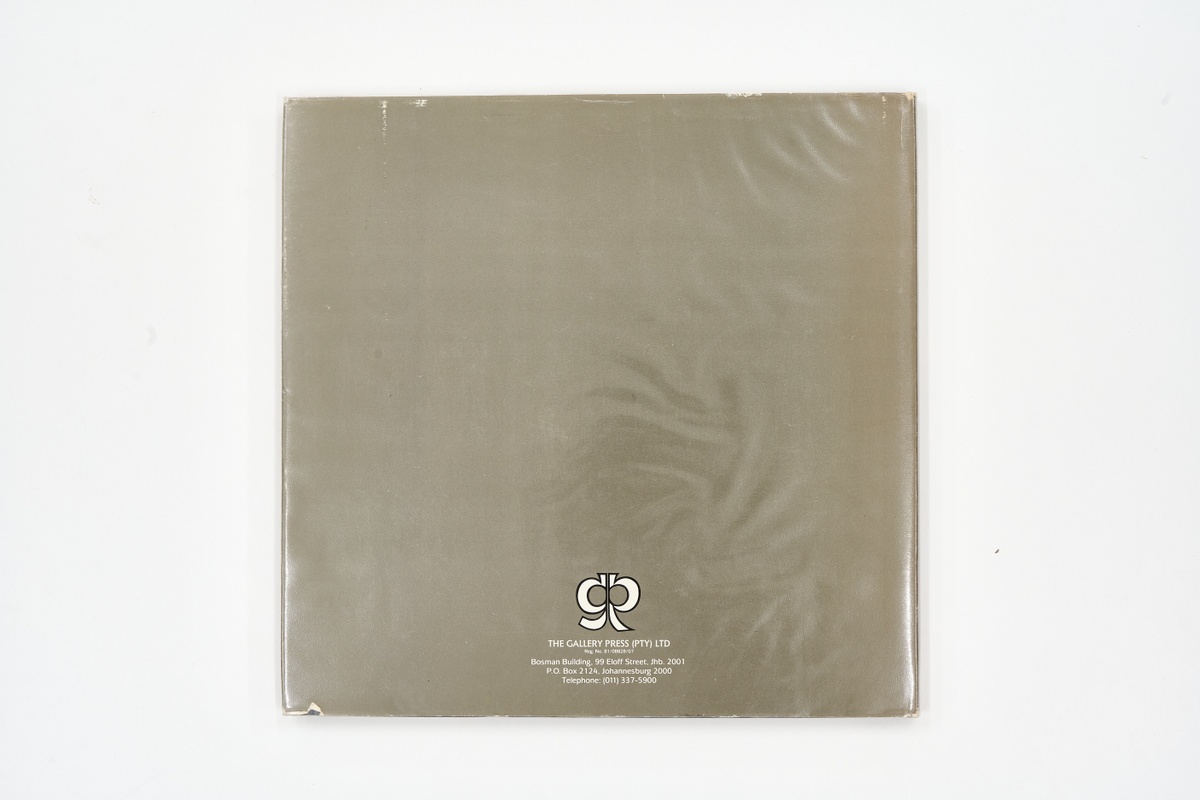 A topdown photograph of the back cover David Goldblatt's photo-book 'In Boksburg' on a white background.
