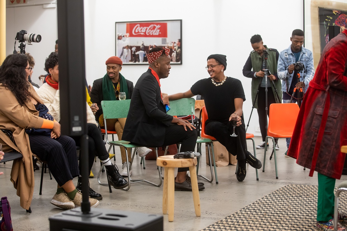 Event photograph from ‘Bare in Conversation with Sir Professor Zanele Muholi’, Session 1 of the ‘Bare Stories’ series hosted on A4’s ground floor that depicts seated attendees.
