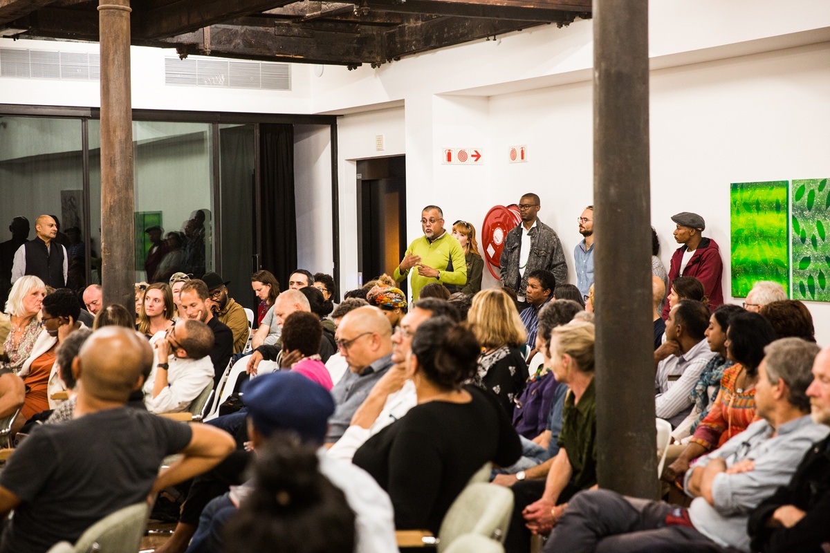 Event photograph from the launch of Omar Badsha’s book ‘Seedtimes’ on A4’s top floor that shows rows of seated attendees.
