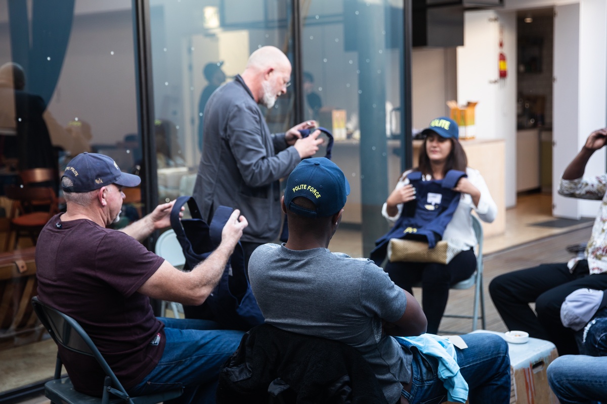 Process photograph from the 2019 rendition of Christian Nerf’s performance piece ‘Polite Force’. Christian Nerf hands out ‘Polite Force’ riot gear to participants on A4’s 2nd floor patio.
