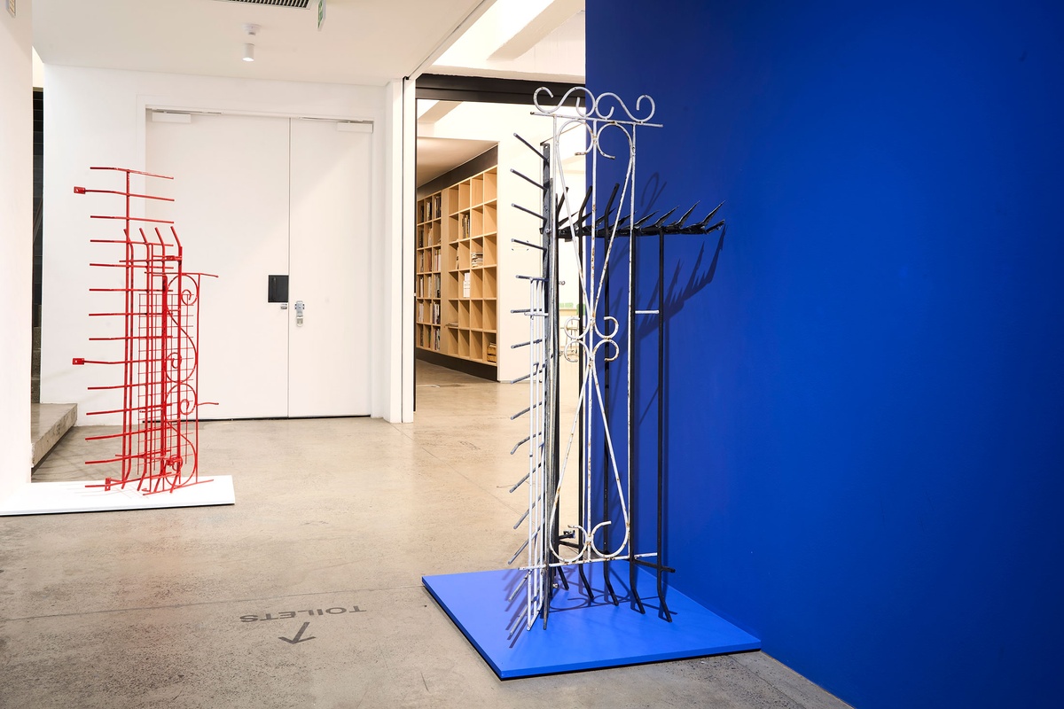Installation photograph from the ‘In Security’ exhibition in A4’s Goods project space, with Gaelen Pinnock’s sculptural assemblages made up of security cameras, burglar bars and concrete slabs.
