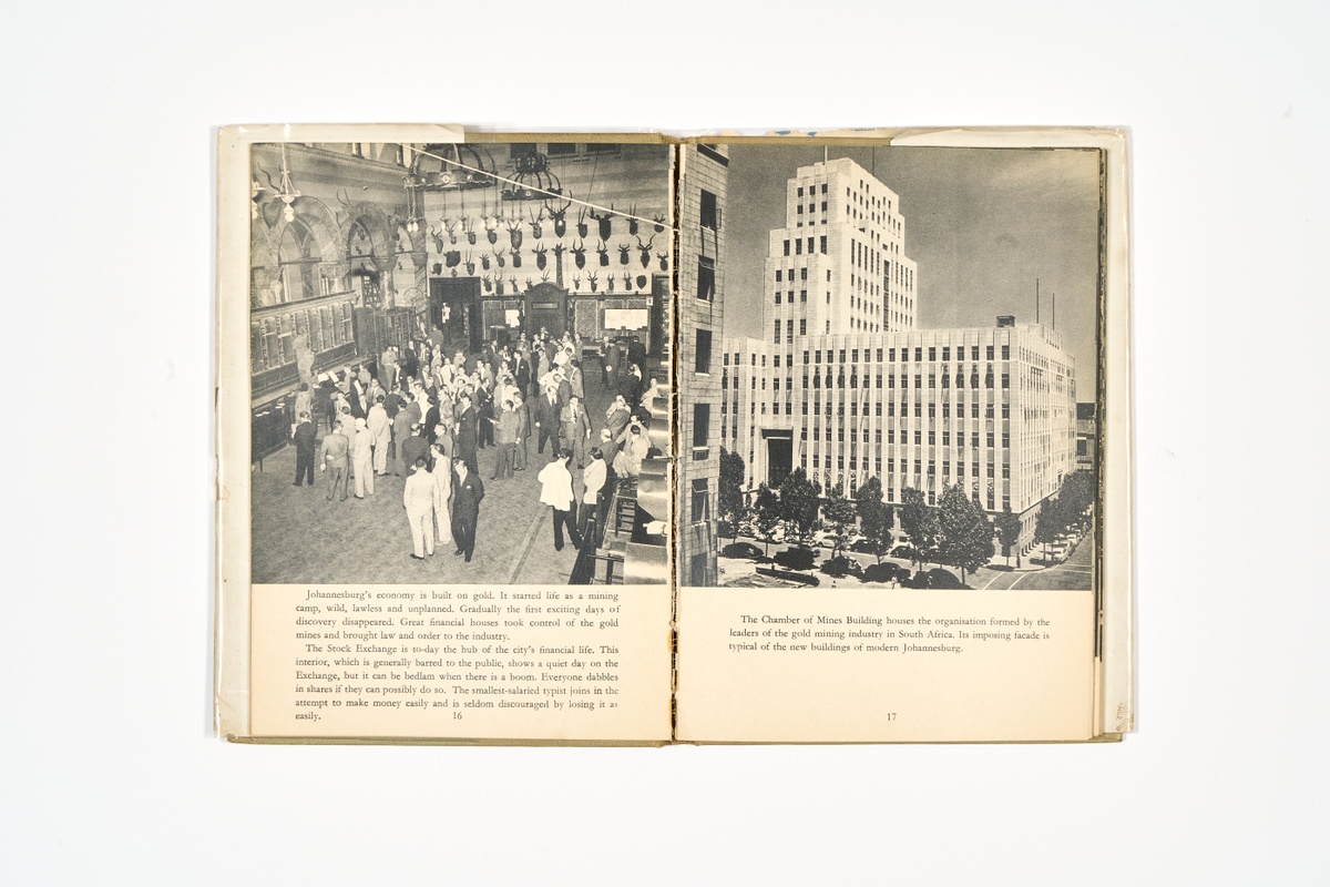 A topdown photograph of a 2-page spread from Ezra Eliovson's photo-book 'Johannesburg: The Fabulous City' on a white background.
