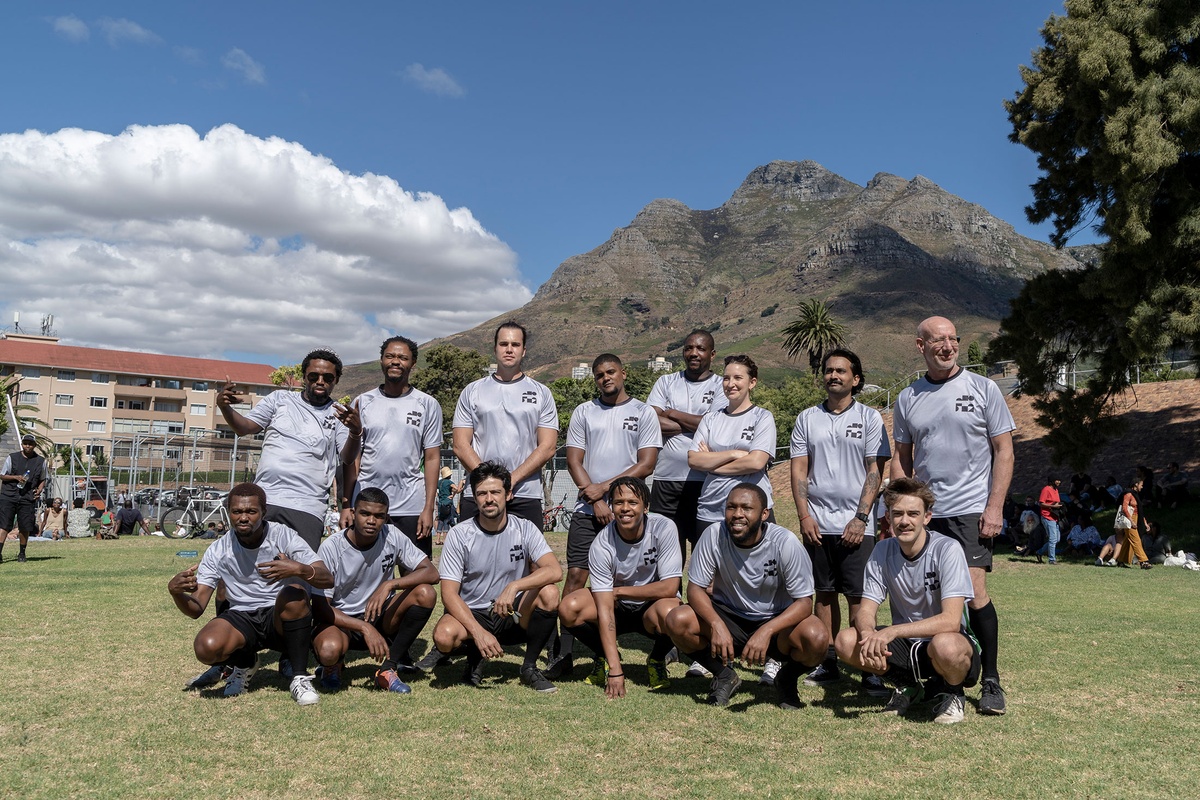 Match day photograph from the 2022 rendition of Exhibition Match that shows a team of soccer players.
