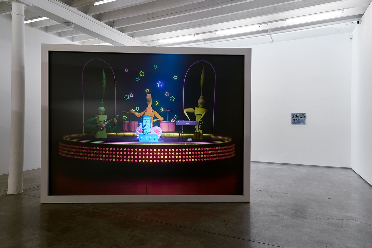 Installation photograph from the 'A Little After This' exhibition in A4 Arts Foundation's gallery. On the left, a large white wooden box with a back-projected screen that forms part of Alex Da Corte's video installation 'ROY G BIV'. On the right, Gerard Sekoto's oil on canvas painting 'Le Pont St. Michel' mounted on a white gallery wall.
