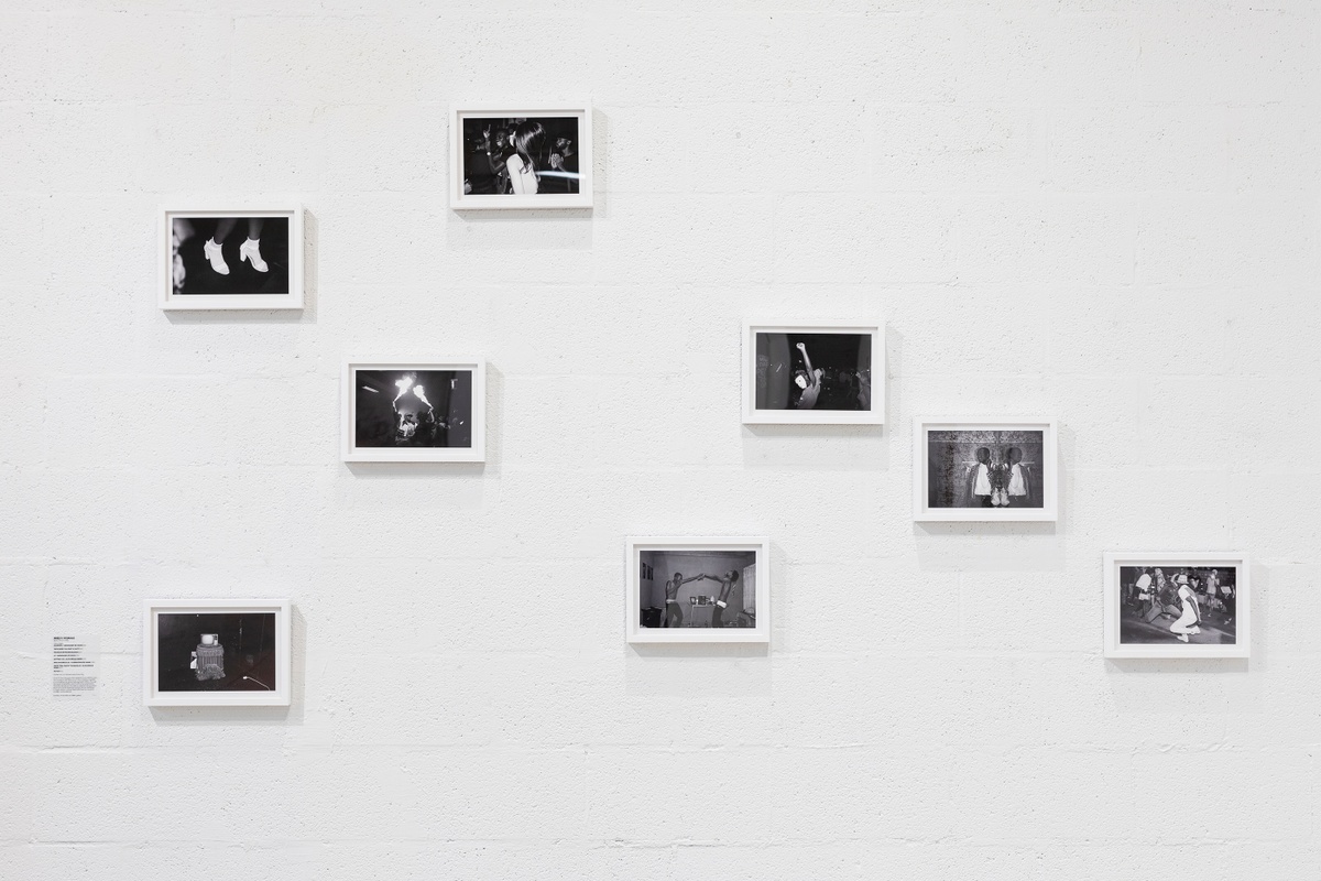 Installation photograph from ‘Crossing Night: Regional Identities x Global Context’ exhibition at the Museum of Contemporary Art Detroit. Multiple monochrome photographs by Musa N. Nxumalo are mounted on the wall.
