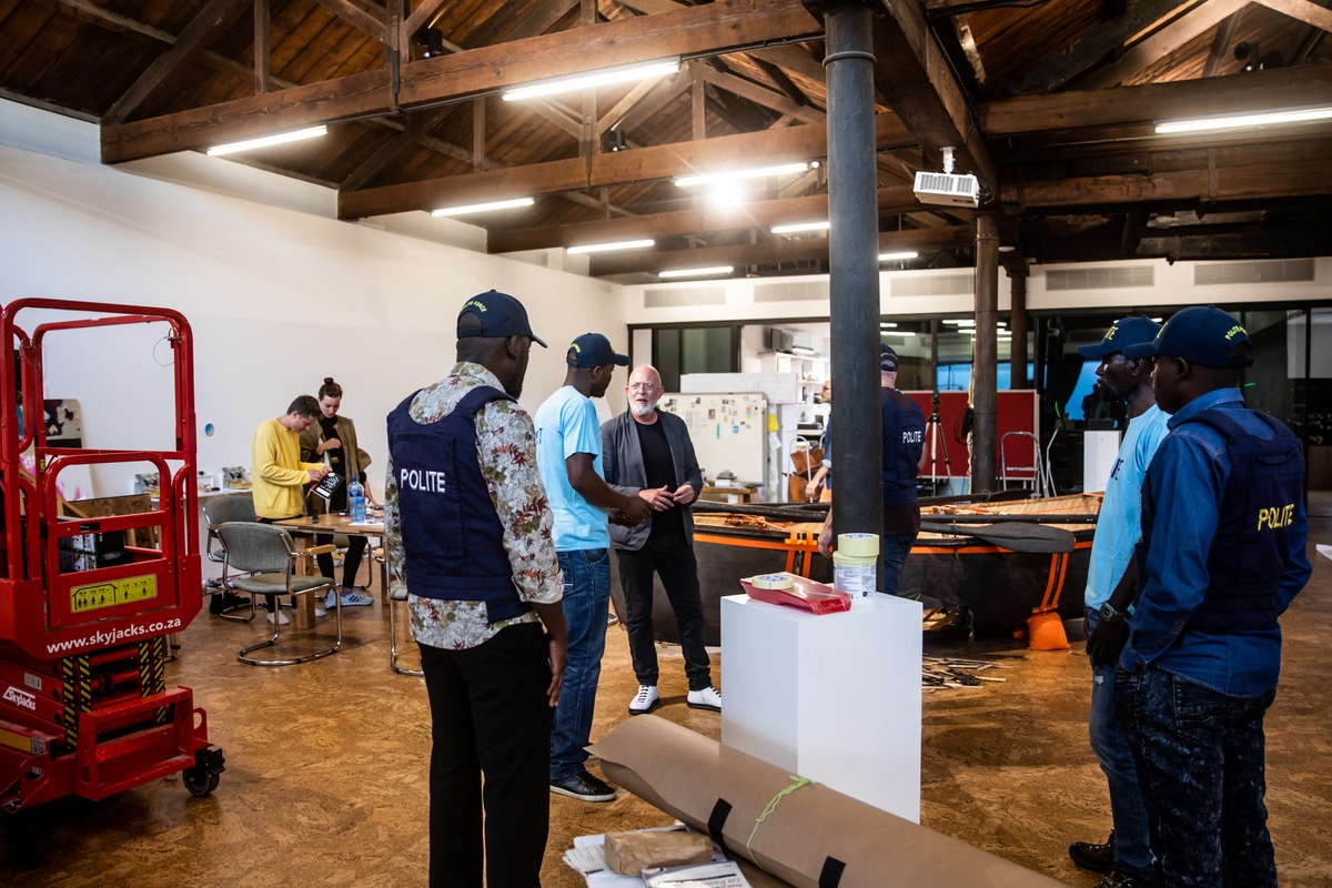 Process photograph from the 2019 rendition of Christian Nerf’s performance piece ‘Polite Force’. Christian Nerf speaks to participants wearing ‘Polite Force’ riot gear on A4’s 2nd floor.
