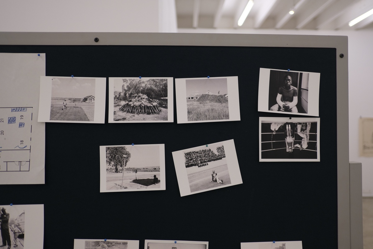 Process photograph from the ‘Picture Theory’ exhibition in A4’s Gallery that depicts a pinboard with small photographic prints from David Goldblatt’s archive.
