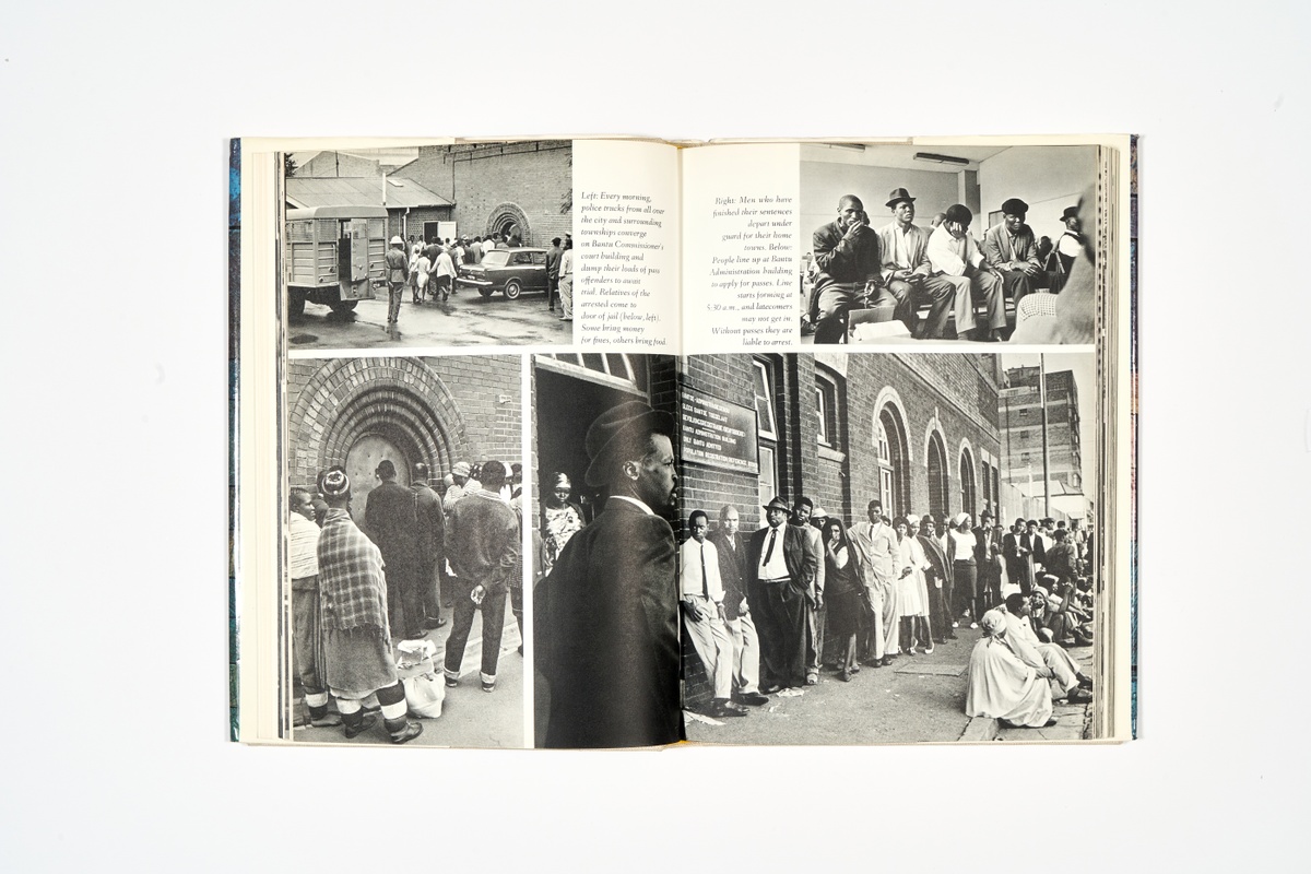 A topdown photograph of a 2-page spread from Ernest Cole's photo-book 'House of Bondage' on a white background.
