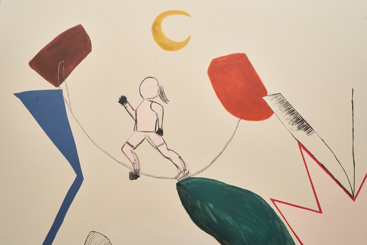 A photograph of a detail from ‘The Prodigal Daughter,’ a wall mural by Hannah Noor Mohamed, that depicts a femme figure running among geometrical shapes and objects, including a sickle moon.
