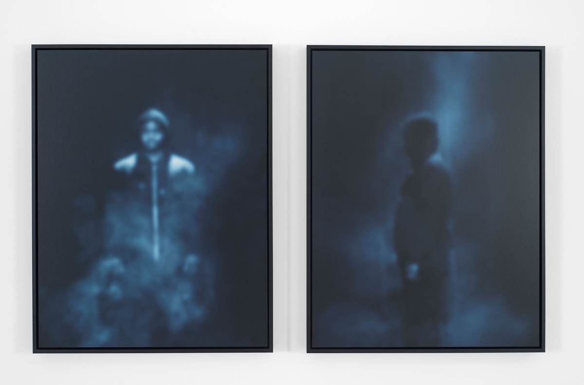 An installation photograph shows Carrie Mae Weems’ photographic diptych mounted on a white wall.
