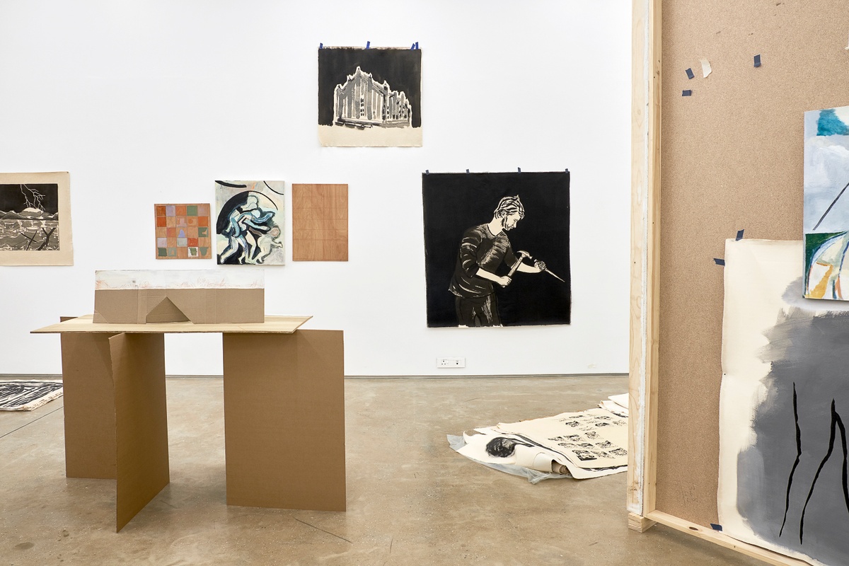 Installation photograph from the 2018 rendition of ‘Parallel Play’ in A4’s Gallery. At the front, a cardboard structure by Jonah Sack sits on the gallery floor. At the back, two dimensional works by Jonah Sack line the gallery wall.
