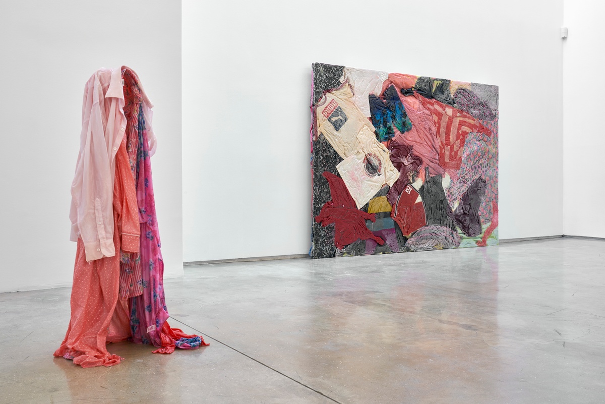 Installation photograph from the ‘without a clear discernible image’ exhibition in A4’s Gallery. On the left, Kevin Beasley’s untitled resin and garment sculpture stands on the gallery floor. On the right, Beasley’s resin and garment work ‘Arizona South Africa’ is mounted on the gallery wall.
