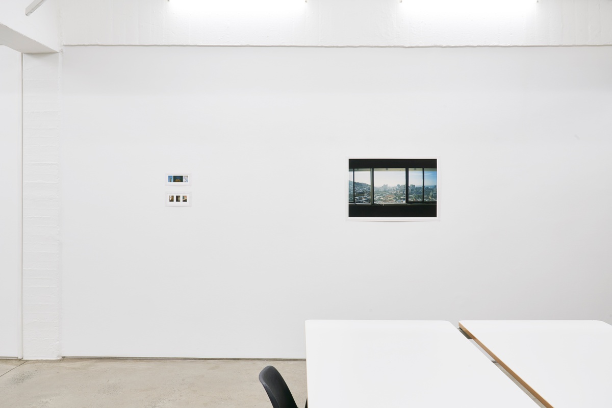 Installation photograph from the ‘Missing Subject’ exhibition in A4’s Library. On the left, two photographic triptychs by Andile Phewa - one untitled and one from their ‘Photo Album’ series - are mounted on the wall. On the right, Phewa’s photograph ‘1604’ is mounted on the wall.
