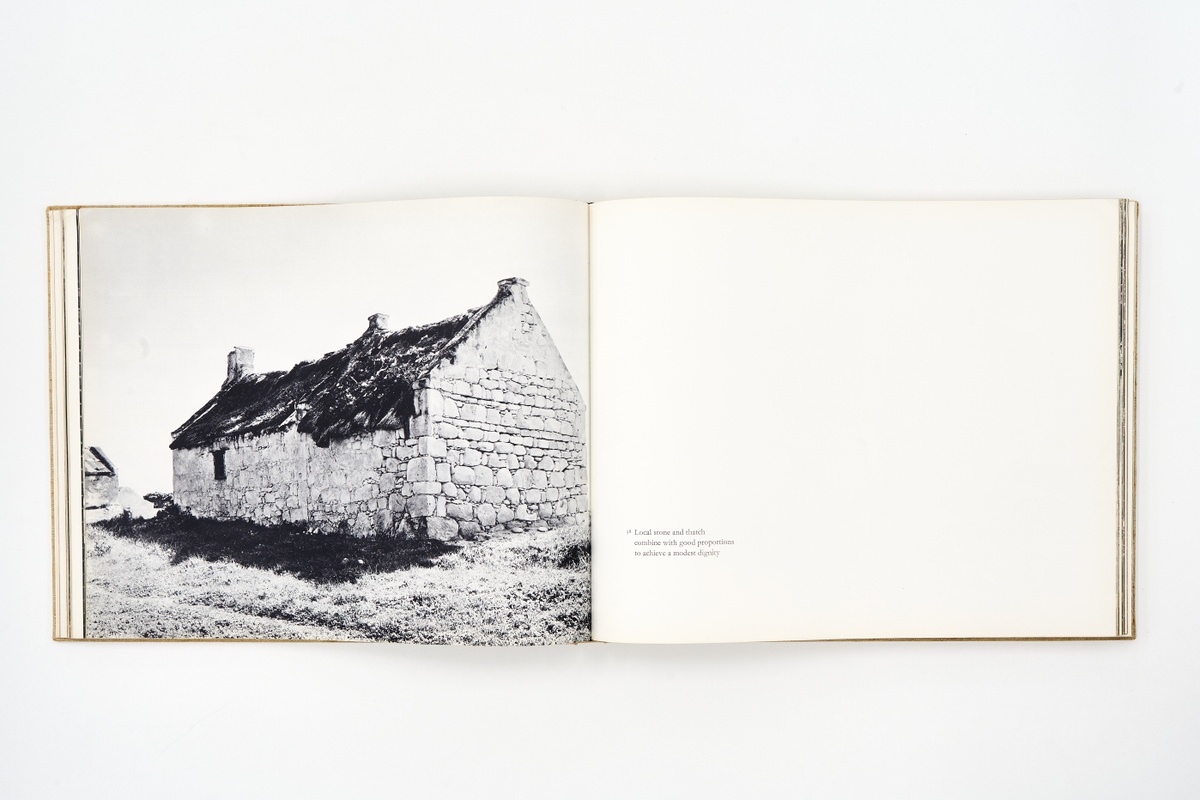A topdown photograph of a 2-page spread from Albert Newall's photo-book 'Images of the Cape' on a white background.
