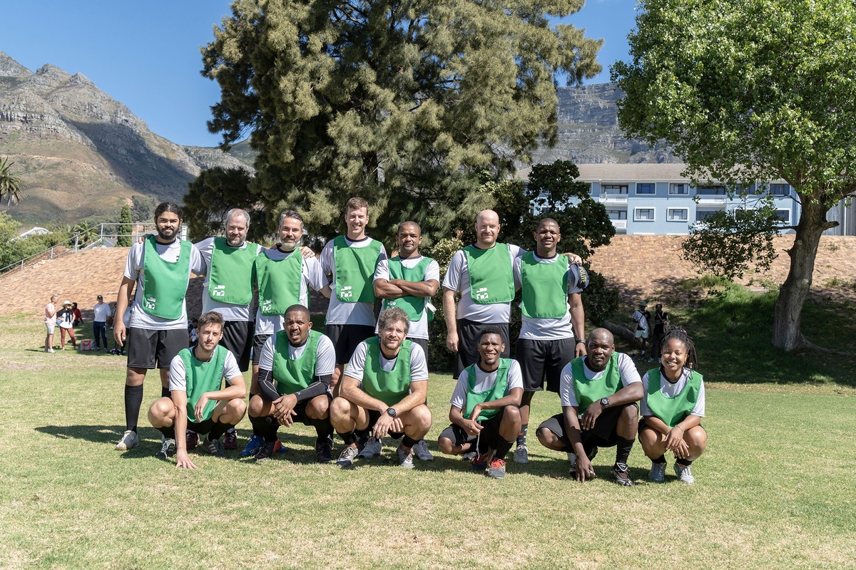 Match day photograph from the 2022 rendition of Exhibition Match that shows a team of soccer players.
