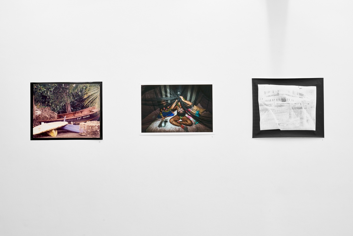 Installation photograph from the ‘In Your Place’ exhibition on A4’s ground floor. On the left, Freddie L. Rankin II’s photograph ‘Untitled 1 - The Isle of Flowers, 1848.’ In the middle, Avijit Halder’s photograph ‘Building the Fort.’ On the right, Samantha Box’s print ‘Map #1’.
