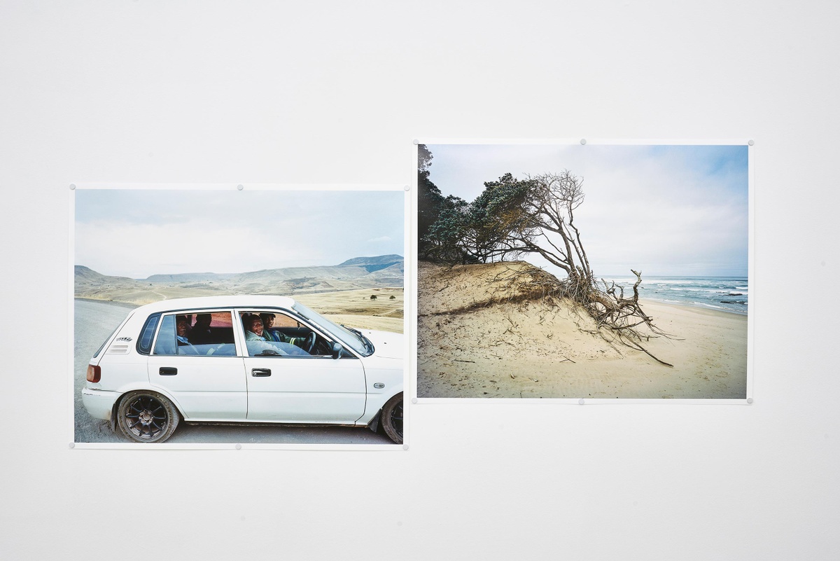 Installation photograph from the ‘Tell it to the Mountains’ exhibition in A4’s Gallery. On the left, Lindokuhle Sobekwa’s photograph ‘Ntasbasgogo Qumbu’ is mounted on the wall. On the right, Sobekwa’s photograph ‘Ngqeleni’ is mounted on the wall.
