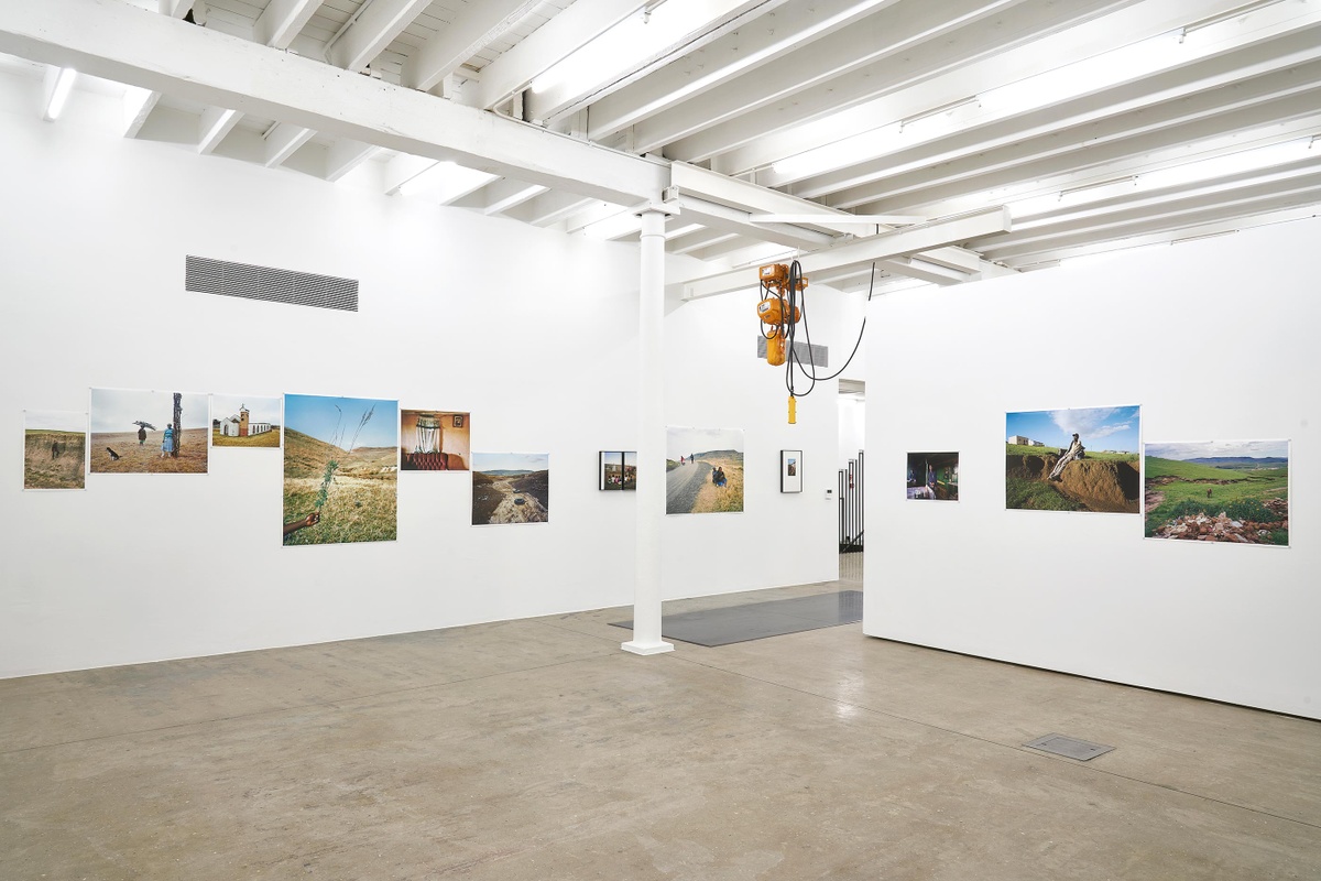 Installation photograph from the ‘Tell it to the Mountains’ exhibition in A4’s Gallery. Lindokuhle Sobekwa’s photographs line the gallery wall.
