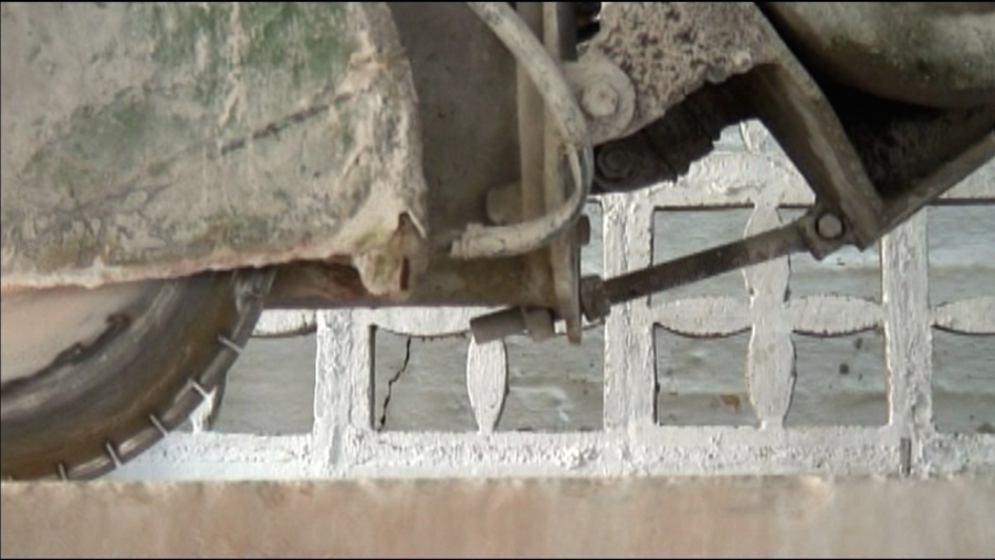 A still frame from Adrian Melis' video work 'The Making of Forty Rectangular Pieces for a Floor Construction'.
