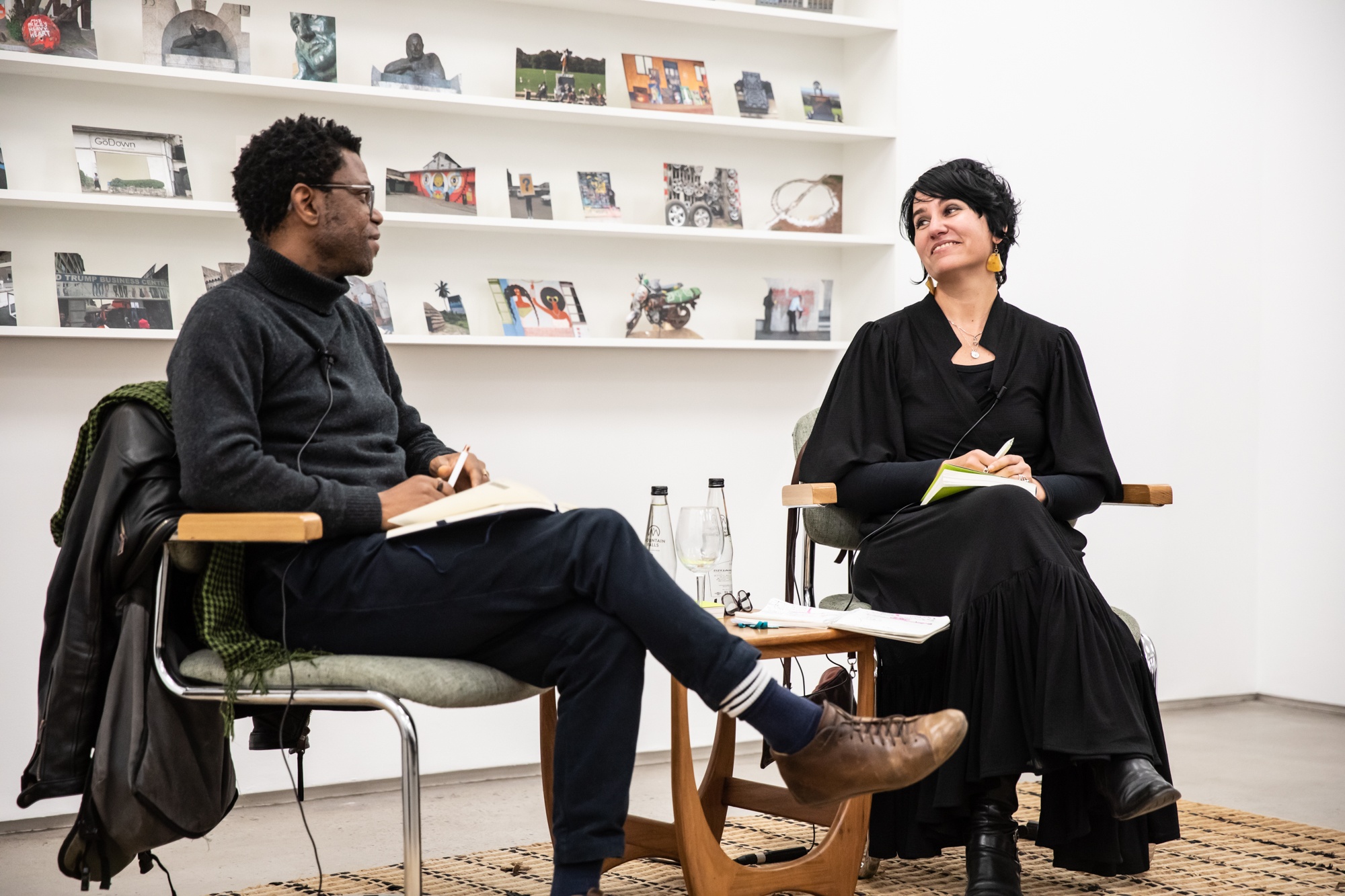 Event photograph from the book launch of Kim Gurney’s ‘Panya Routes’ in A4’s Reading Room shows Gurney and Neo Muyanga seated in conversation.

