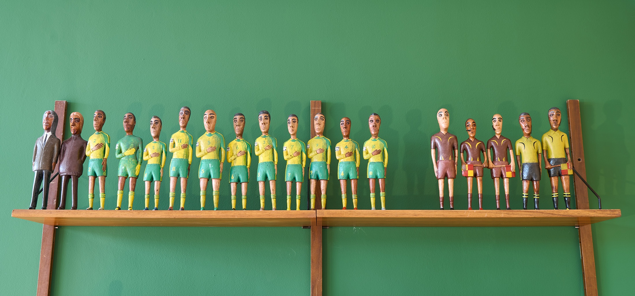 Johannes Segogela's series of oil painted sculptures 'Bafana Bafana Soccer Team'.
