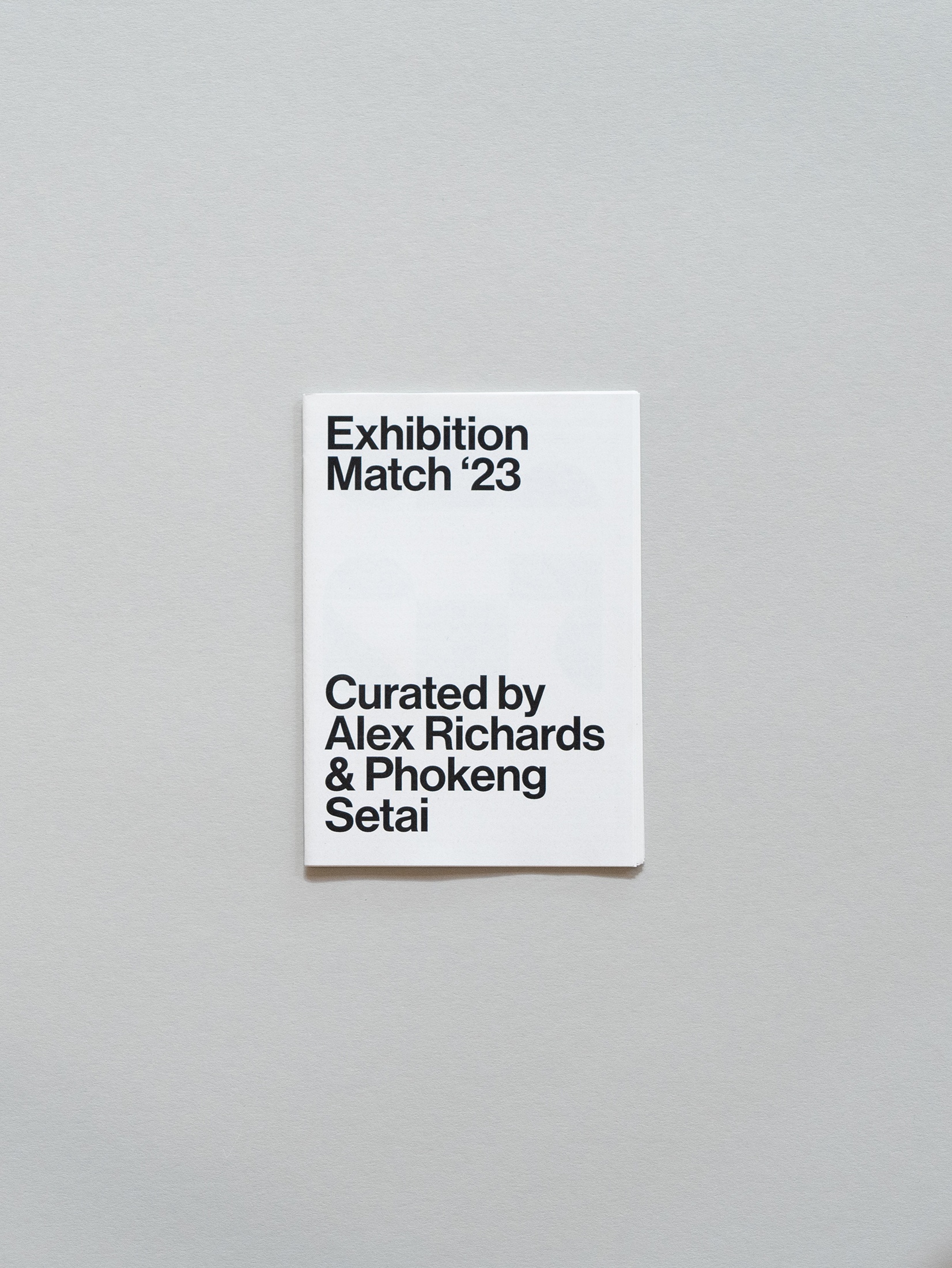Photograph of the wayfinder publication for Exhibition Match ICTAF '23, curated by Alexander Richards and Phokeng Tshepo Setai at Fives Futbol, Grand Central Shopping Centre.
