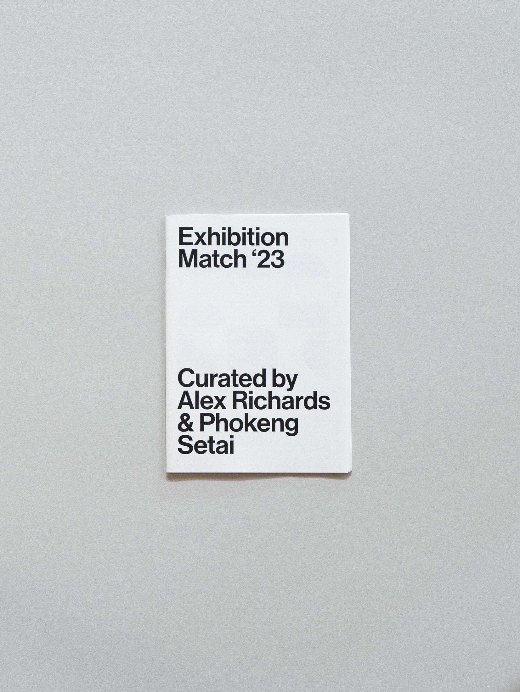 Photograph of the wayfinder publication for Exhibition Match ICTAF '23, curated by Alexander Richards and Phokeng Tshepo Setai at Fives Futbol, Grand Central Shopping Centre.
