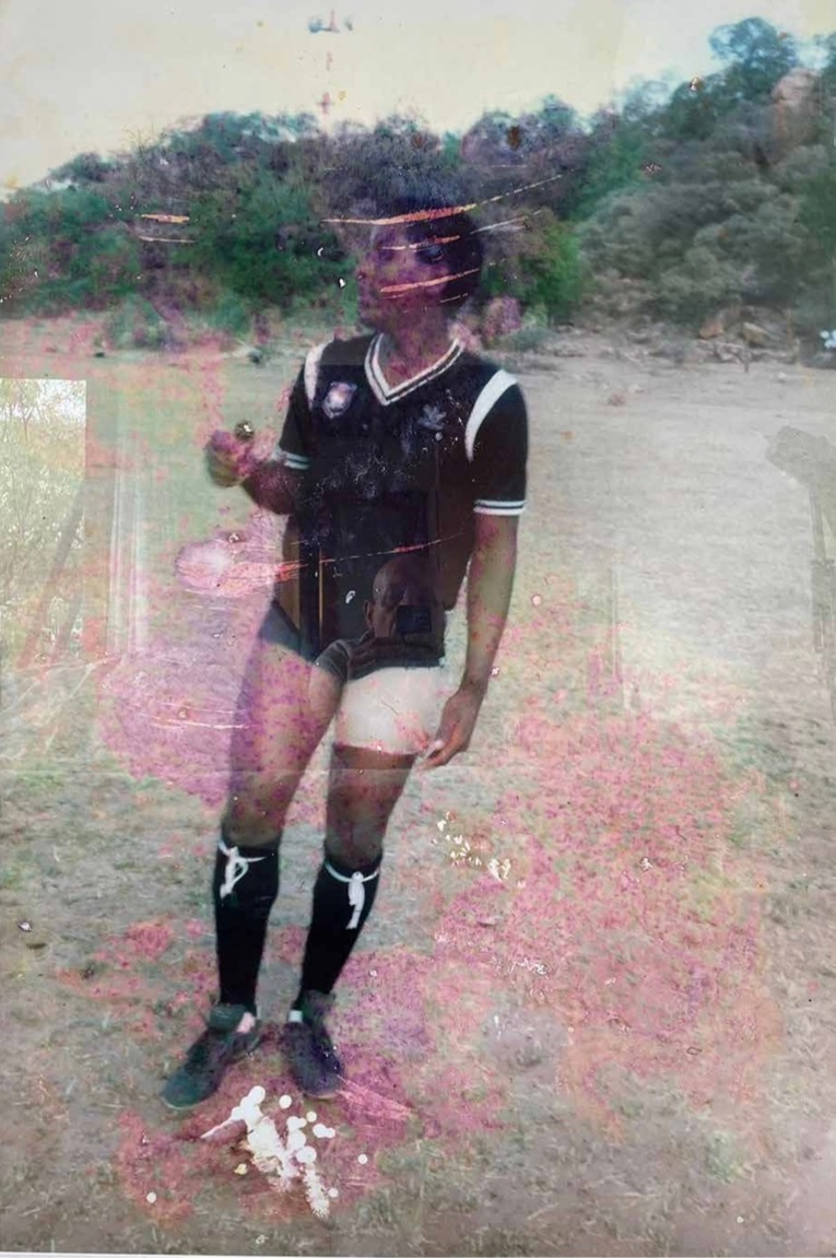 Moshekwa Langa's photograph 'Magaola' depicts a soccer player.

