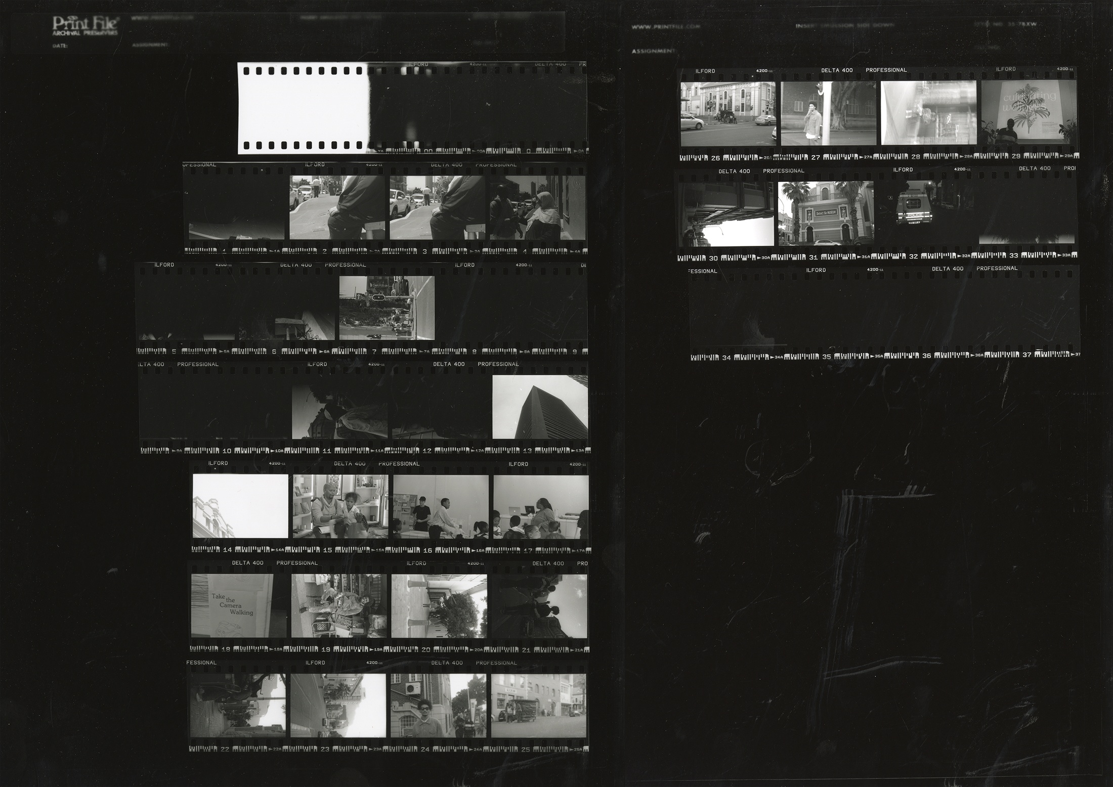 Photographic contact sheet from ‘Contact’, a collaboration between A4’s proto~ museum shop and Oath Magazine, with the negatives of participant photographs arranged diagonally across the page.
