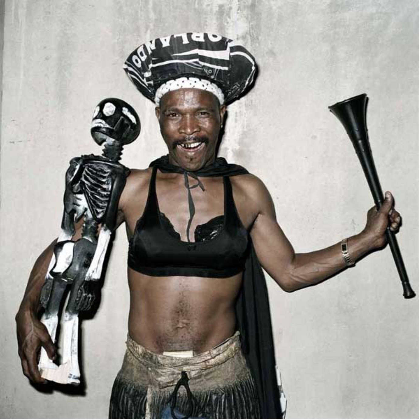 Pieter Hugo's photograph 'Good Enough Mabaso, Orlando Pirates supporter, Coca-Cola Cup semi-final, Rustenburg, 2005'.
