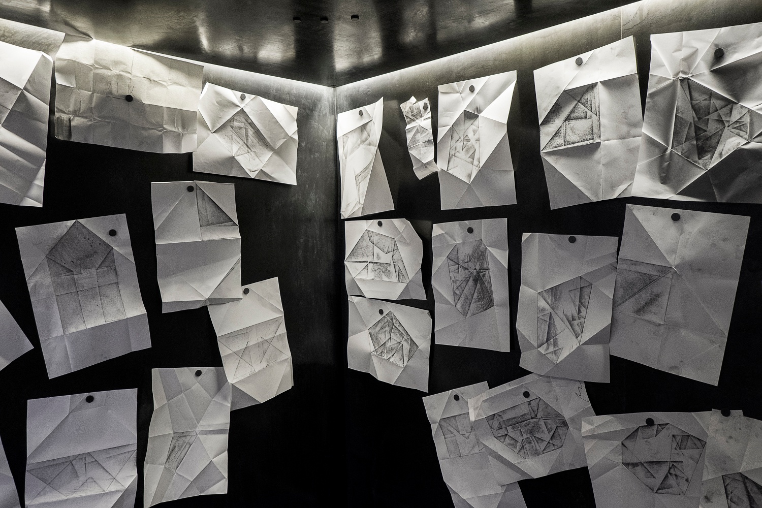 Installation photograph from the More For Less exhibition in A4’s Gallery. Graphite drawings from Christian Nerf’s participatory action ‘Teaching Teachers’ are displaued on the inside of A4’s elevator with magnets.
