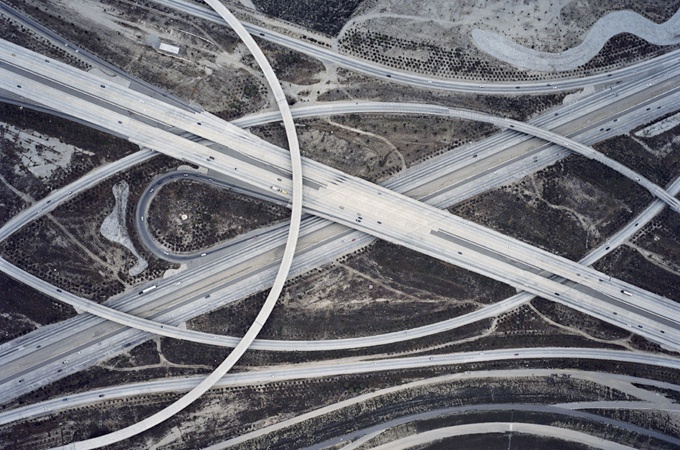 Ephemera from the ‘Curatorial Workshop’ exchange lead by Matthew S Witkovsky and Janine Mileaf on A4’s top floor. An areal photograph of overlapping motorways.
