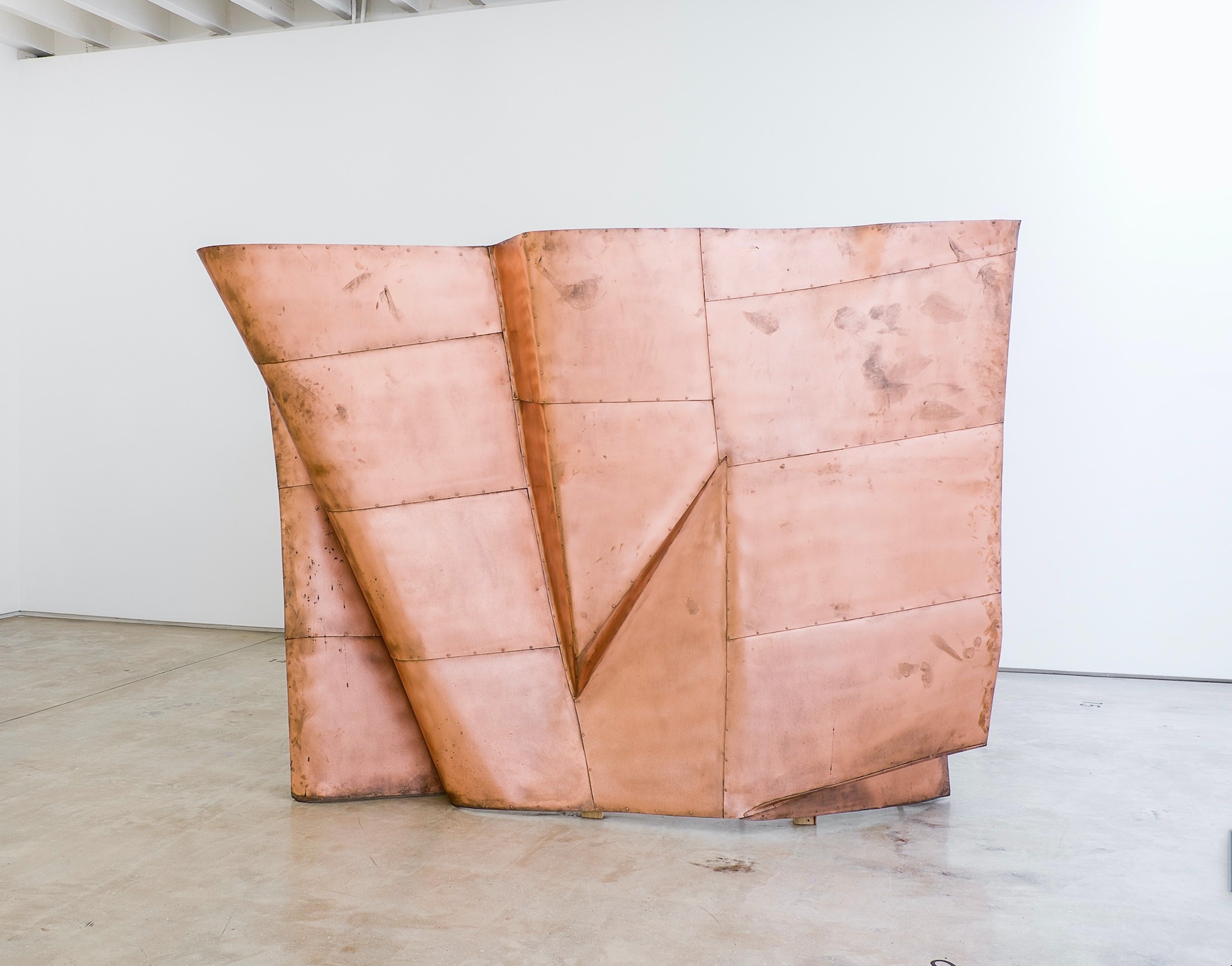 A photograph of Danh Võ's copper and steel sculpture 'We the People'.
